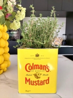 Coman's mustard blikken